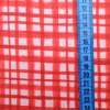 Bavlnená látka Asymetrické štvorčeky červené 150cm