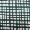 Bavlnená látka Asymetrické štvorčeky zelené 150cm