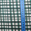 Bavlnená látka Asymetrické štvorčeky zelené 150cm