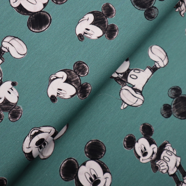 Bavlnený úplet Mickey mause na zelenej