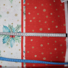 Vianočná dekoračná látka LONETA obojstranná bordúra šišky