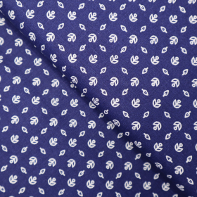 Bavlnená látka lístky na modrej