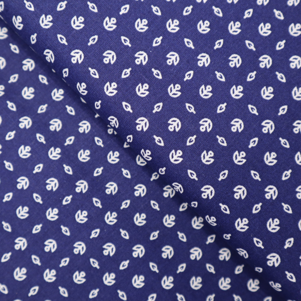 Bavlnená látka lístky na modrej