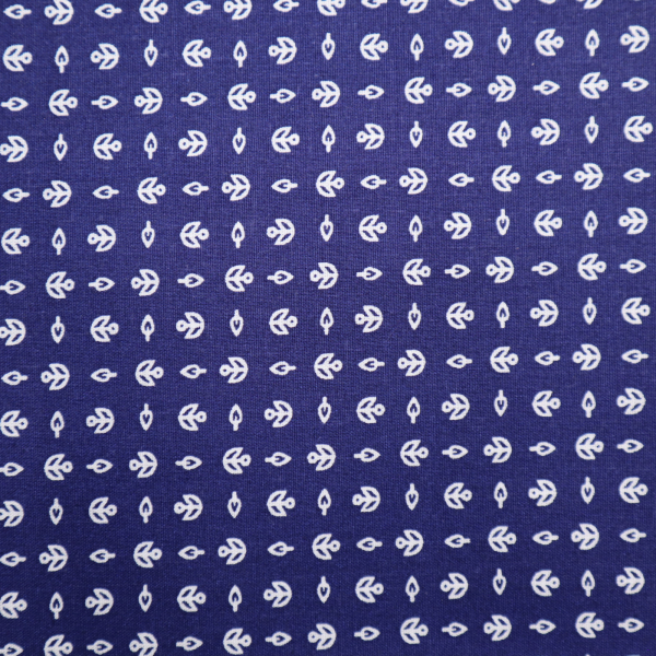 Bavlnená látka lístky na modrej