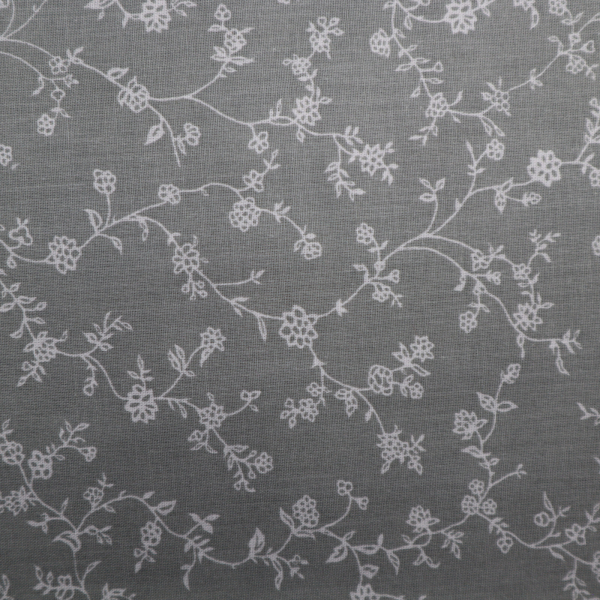 Bavlnená látka lístky na sivej