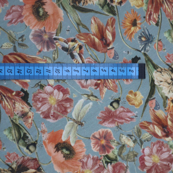 Nepočesaná teplákovina Kvetinky na modrej