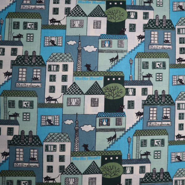 Bavlnená látka domy bledo modré
