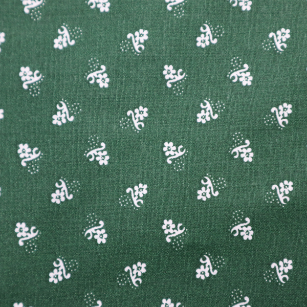 Bavlnená látka folk kvety na zelenej